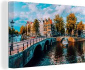 Canvas schilderijen - Panorama - Amsterdam - Water - Architectuur - Bomen - Slaapkemer - Woonkamer 180x120 cm - Canvas doek - Canvas