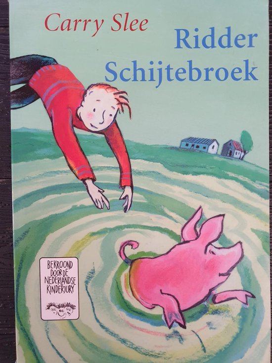 Boek 'Ridder Schijtebroek' met een jongen in een rood trui die naar een vliegend varken reikt. Met de tekst 'Bekroond Boek van het Nederlandse Kinderjury'.