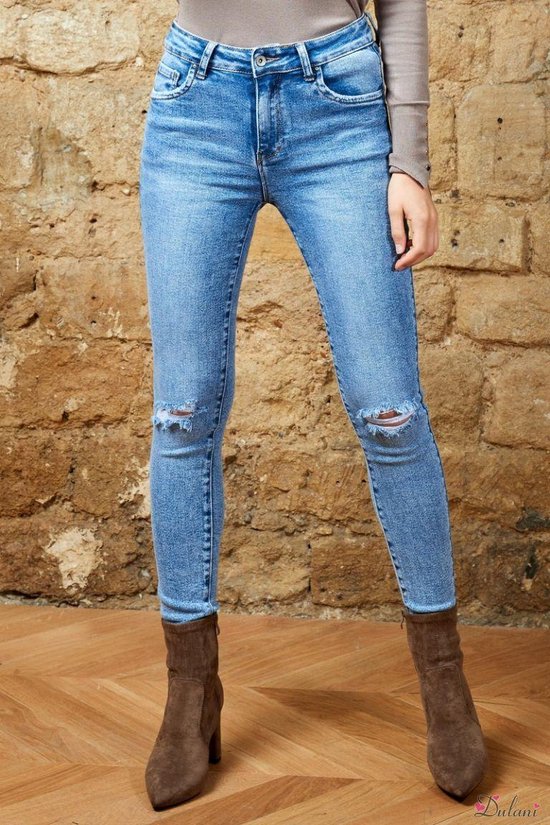 Broek Toxik3 medium hoge taille jeans met scheuren | bol.com