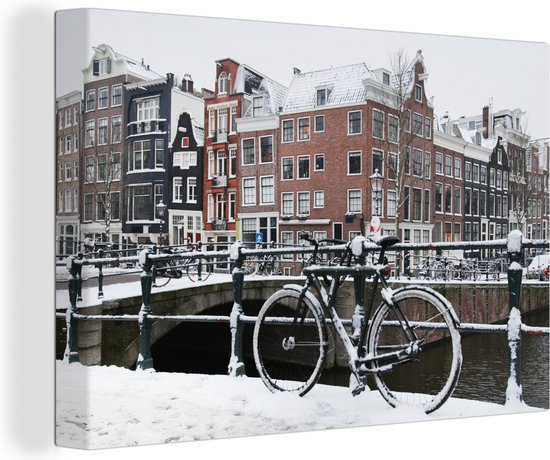 Canvas schilderij 150x100 cm - Wanddecoratie Amsterdam - Fiets - Winter - Muurdecoratie woonkamer - Slaapkamer decoratie - Kamer accessoires - Schilderijen