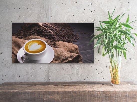 Artaza Canvas Schilderij Kopje Koffie In Een Hartje Met Koffiebonen - 60x30 cm - Wanddecoratie Woonkamer - Schilderijen - Muurdecoratie