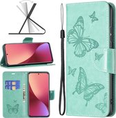 Mobigear Telefoonhoesje geschikt voor Xiaomi 12 Hoesje | Mobigear Butterfly Bookcase Portemonnee | Pasjeshouder voor 3 Pasjes | Telefoonhoesje voor Pinpas / OV Kaart / Rijbewijs - Groen