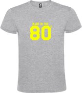 Grijs T shirt met print van " Made in the 80's / gemaakt in de jaren 80 " print Neon Geel size M