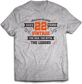 22 Jaar Legend - Feest kado T-Shirt Heren / Dames - Antraciet Grijs / Oranje - Perfect Verjaardag Cadeau Shirt - grappige Spreuken, Zinnen en Teksten. Maat XL