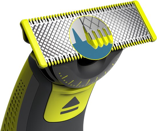 Close-up van de felgroene en metalen scheerkop van een Philips OneBlade scheerapparaat met een vergroot detail van de mesjes.