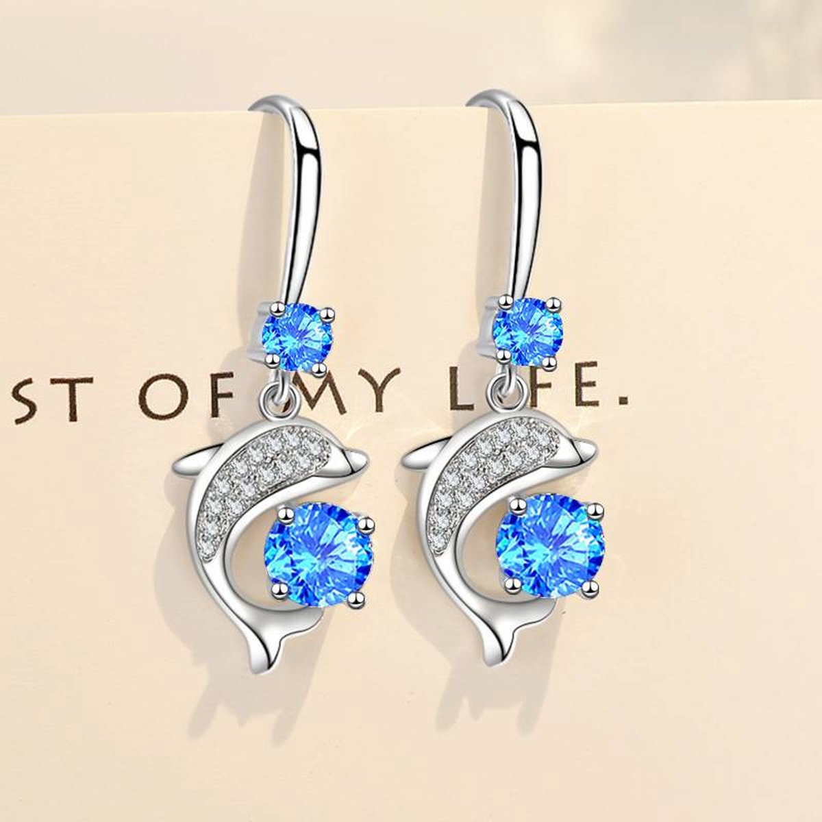Oorbellen dolfijnen met strass blauw