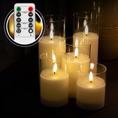 Vier witte LED kaarsen in glazen houders, met een afstandsbediening met timer en lichtstanden.