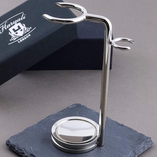 Zilverkleurige metalen scheerstandaard met haken voor kwast en scheermes.