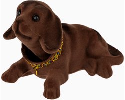 Een vrolijk lief knikkend hondje met een bewegende kop. Leuk om op de achterbank in de auto te zetten! Deze hond is voor decoratie en niet om mee te spelen. Natuurlijk is de hond ook leuk om cadeau te geven aan iemand.