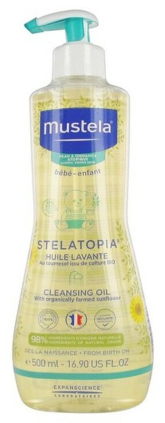 Mustela Stelatopia Cleansing Oil, 500 ml fles met pompje, met zonbloem-motief.