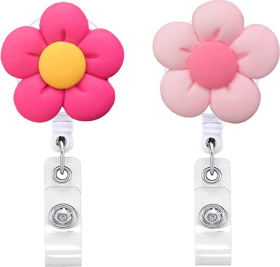 Set van twee bloemenbadgehouders: roze met geel hartje en lichtroze met roze hartje.