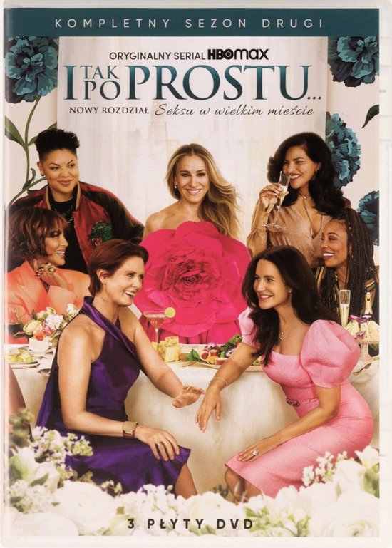 De cast van And Just Like That, met Carrie Bradshaw in het midden, in een feestelijke setting met bloemen.