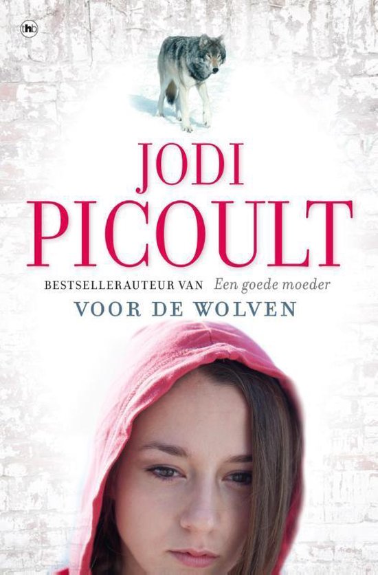 Boek "Voor de wolven" van Jodi Picoult met een wolf op een stenen muur en een meisje met rode capuchon.