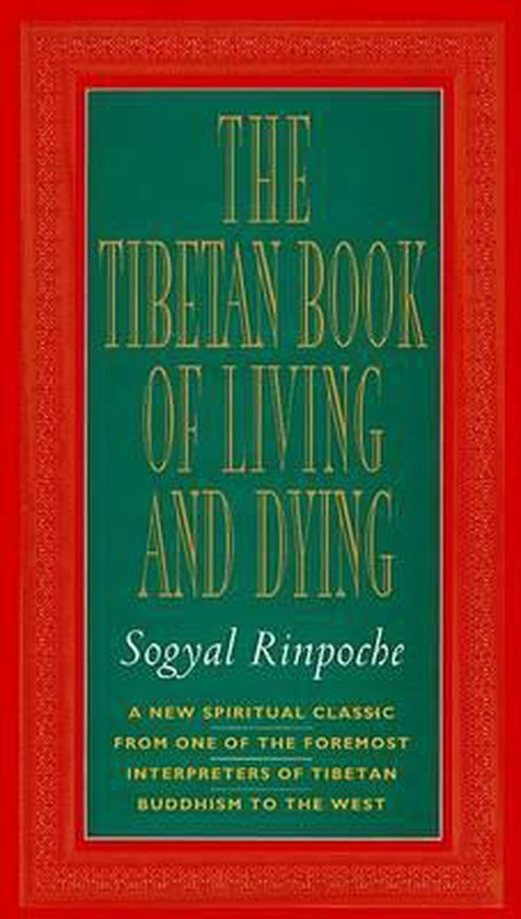 Boek "The Tibetan Book of Living and Dying" van Sogyal Rinpoche, met een groene kaft en rode rand.