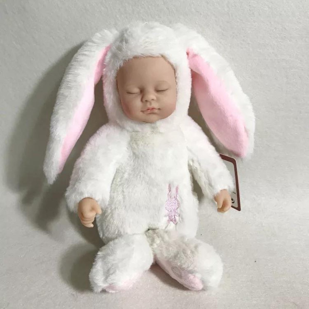 Sleeping baby in wit konijnen pakje - knuffel slaap pop 27cm | bol.com