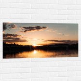 WallClassics - Muursticker - Zonsondergang aan Bosrand - 100x50 cm Foto op Muursticker