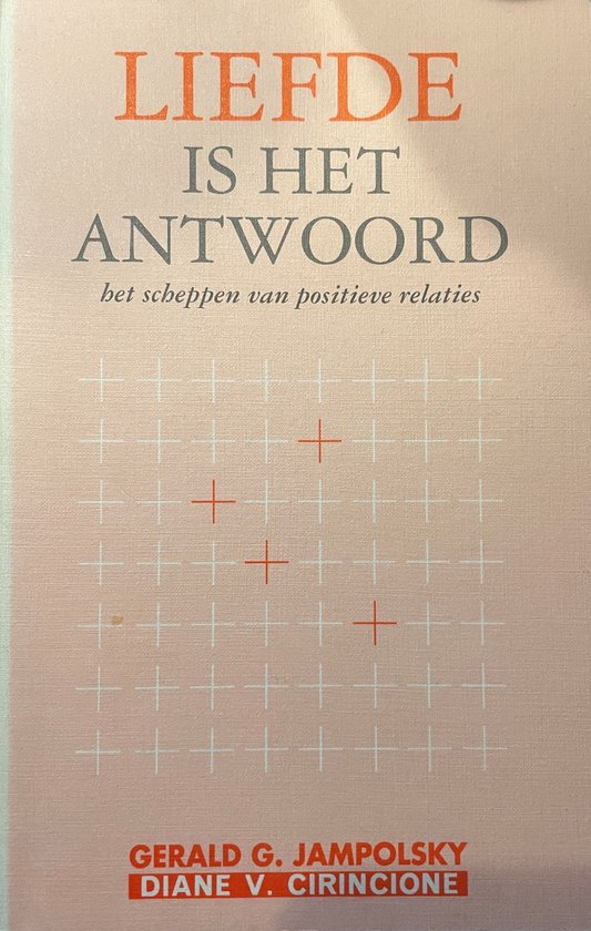 Liefde is het antwoord, het scheppen van positieve relaties. Boek met rode tekst op een roze rasterachtergrond.