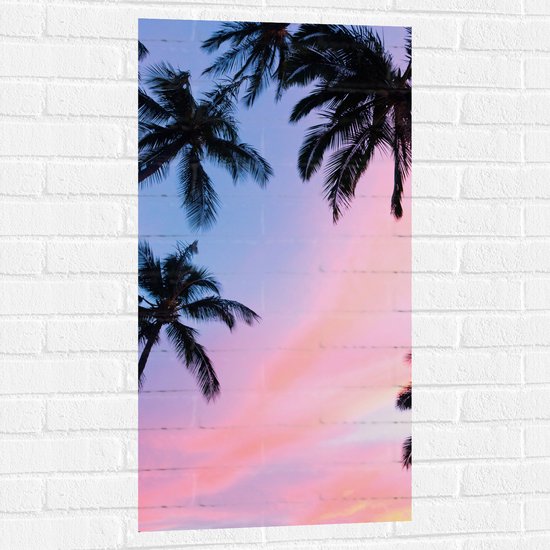 WallClassics - Muursticker - Silhouet van Palmbomen bij Pastekleuren in de Lucht - 50x100 cm Foto op Muursticker