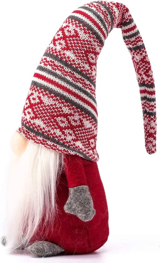 Nain de Noël de profil, avec un long bonnet pointu en tricot rouge, blanc et gris à motifs et une barbe blanche.