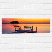 WallClassics - Muursticker - Bankjes op Vlonder bij Prachtige Zonsondergang - 60x20 cm Foto op Muursticker