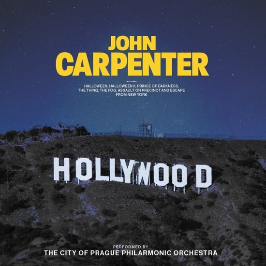 Albumhoes met John Carpenter's naam in gele letters boven de Hollywood Hills onder een sterrenhemel. Bevat tekst 'INCLUDES HALLOWEEN, HALLOWEEN II, PRINCE OF DARKNESS...'.
