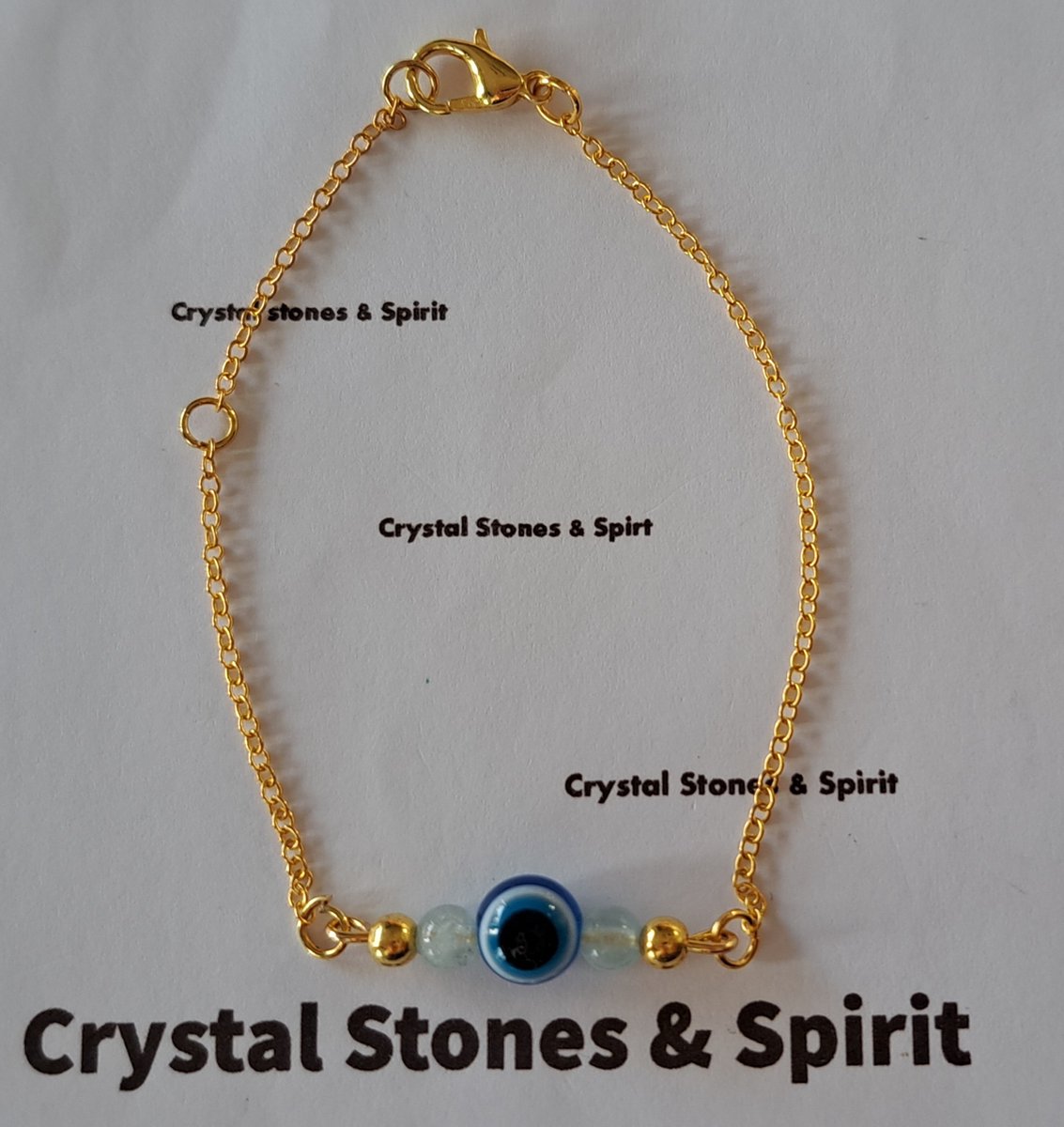 Armband "Boze Oog" met Aquamarijn, goudkleurig