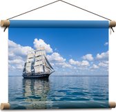 WallClassics - Textielposter - Groot Zeilschip op Helder Water - 40x30 cm Foto op Textiel
