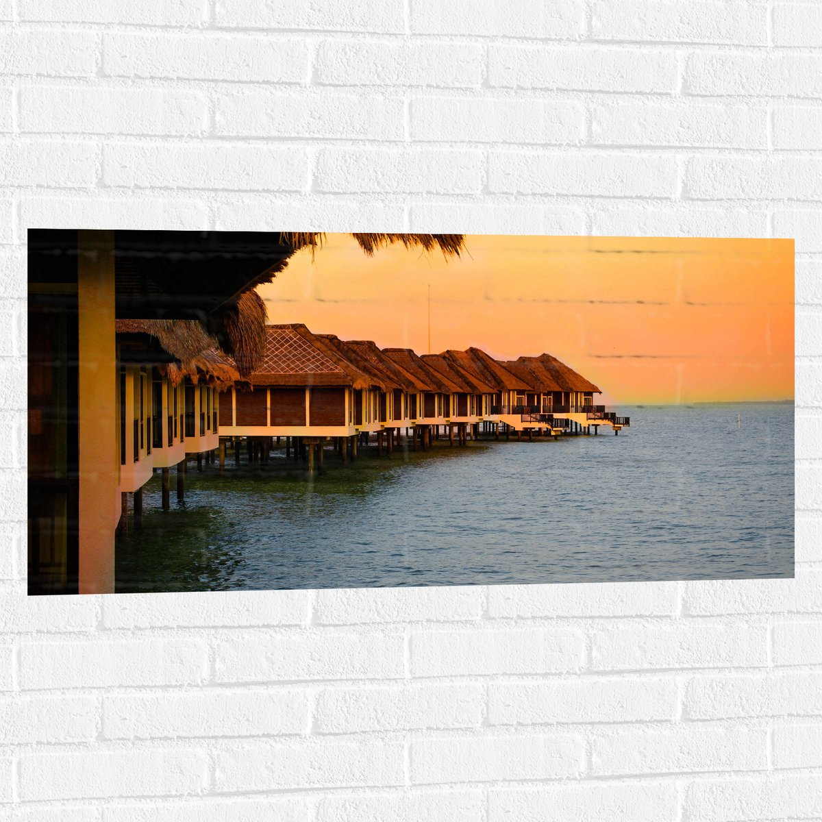 Muursticker - Huisjes op Palen in de Zee - 100x50 cm Foto op Muursticker