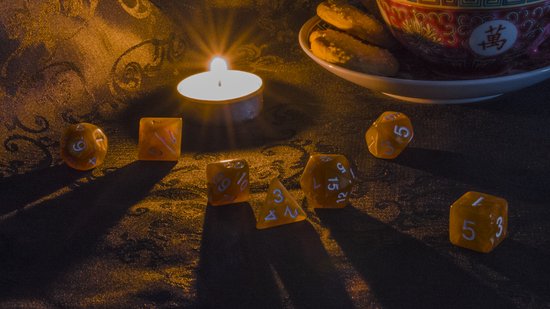 Thumbnail van een extra afbeelding van het spel Dungeons & Dragons dobbelstenen set - Oker - 7 stuks