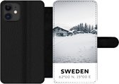 Bookcase Geschikt voor iPhone 12 Pro Max telefoonhoesje - Zweden - Sneeuw - Bomen - Met vakjes - Wallet case met magneetsluiting
