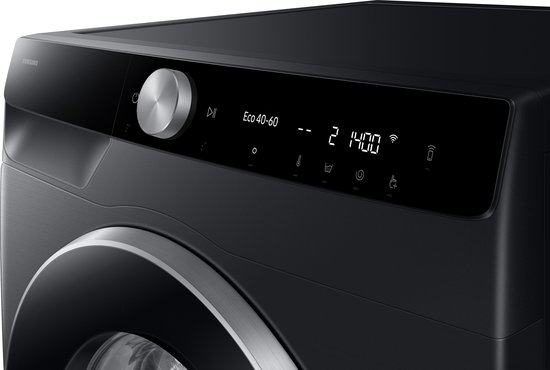 Bovenzijde van een zwarte Samsung wasmachine met draaiknop en digitaal bedieningspaneel.