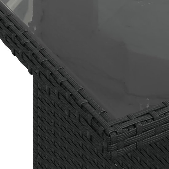 Panier en rotin noir avec plateau en verre.