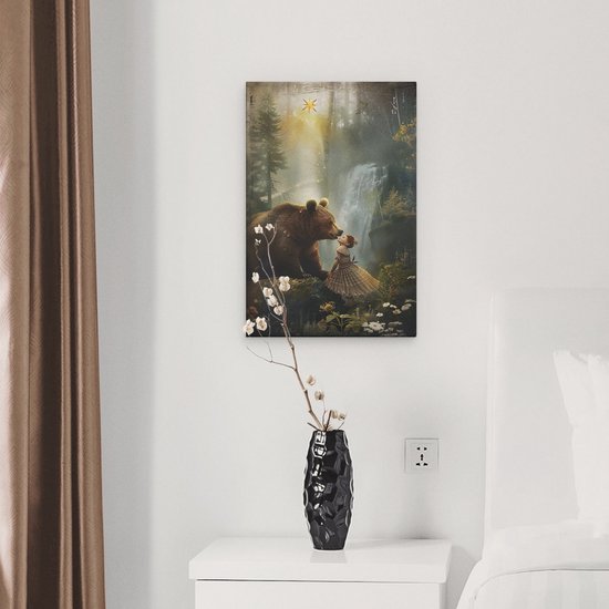 Une peinture d'un ours et d'une fille dans une forêt avec une cascade, accrochée à un mur à côté d'un lit.