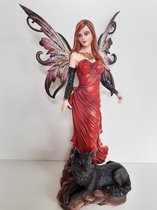 Elfen beeld prachtige grote elf met liggend aan haar voeten een zwarte wolf van Dream Eden  40x21x15 cm