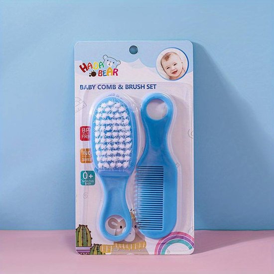 Foto: Babyborstel babykam baby haarverzorging blauw kraamcadeau babyhaartjes kammen