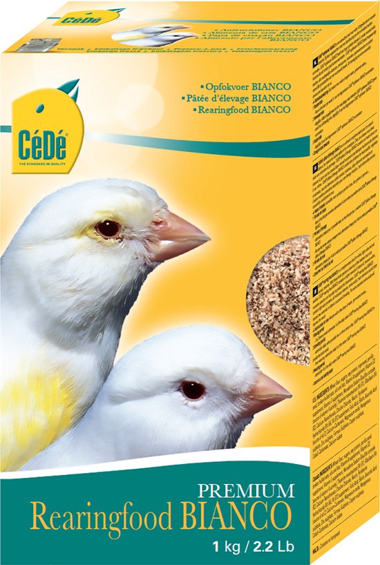 Gele en witte kanarie, met Cédé Opfokvoer Bianco 1 kg op de verpakking.