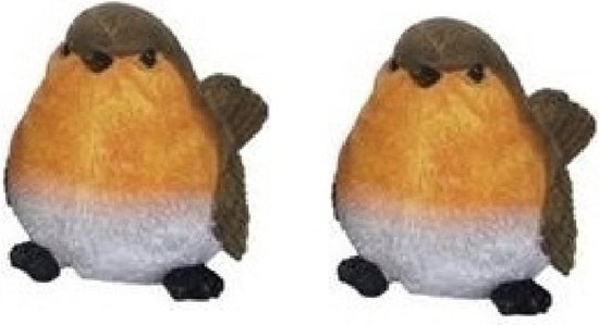 Deux petites figurines de rouge-gorge pelucheux avec des poitrines oranges et des ailes brunes, assises avec de petites pattes noires.
