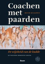 Boek 'Coachen met paarden' met een schilderij van paardenkoppen en 'De wijsheid van de kudde'.