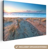 Canvas Schilderij Strand - Paaltjes - Zee - zonsopkomst - Zon - 120x80 cm - Muurdecoratie