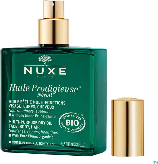 Groene Nuxe Huile Prodigieuse Néroli fles met gouden dop en losse dop.