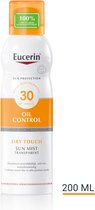 Bol.com Eucerin Sun Oil Control Spray Transparant SPF 30 - Zonnebrandspray - 200 ml aanbieding
