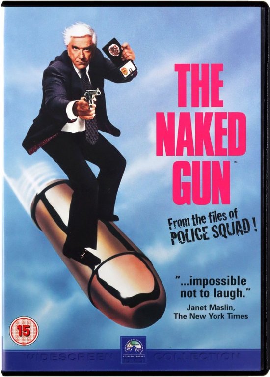 De man met de baard, in een pak en met een pistool, rijdt op een kogel. 'The Naked Gun'.