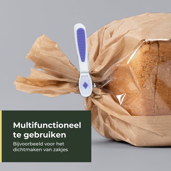 Witte en paarse wasknijper sluit een bruine papieren zak af, "Multifunctioneel te gebruiken".