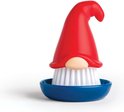 Rode gnome-afwasborstel met witte haren, in een blauw bakje.