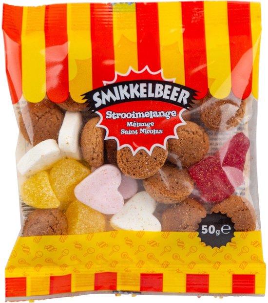 Zakje met strooigoed met 'SMIKKELBEER Strooimelange' en 'Mélange Saint Nicolas' in gele en rode strepen. Bevat koekjes, snoepjes en stukjes snoep.