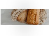 PVC Schuimplaat - Verse Broodjes in Gehaakt Tasje - 60x20 cm Foto op PVC Schuimplaat (Met Ophangsysteem)