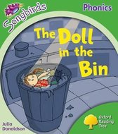 Boekomslag 'The Doll in the Bin' uit de Songbirds Phonics-reeks met een illustratie van een pop in een vuilnisbak.