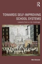 Towards Self-improving School Systems
