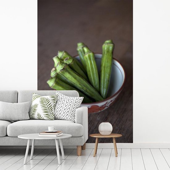 Fotobehang vinyl - Okra groenten in een kommetje breedte 215 cm x hoogte 320 cm - Foto print op behang (in 7 formaten beschikbaar)