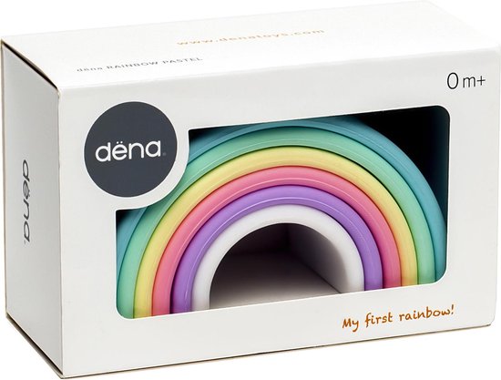 Verpakking van dëna speelgoed met een pastelkleurige regenboog, met 'My first rainbow!' op de voorkant.